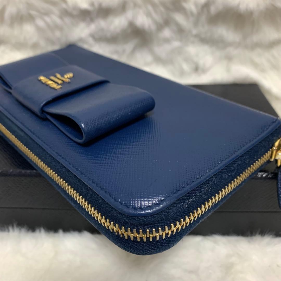 美品　PRADA 長財布　サフィアーノ　リボン　ラウンドジップ　ネイビー