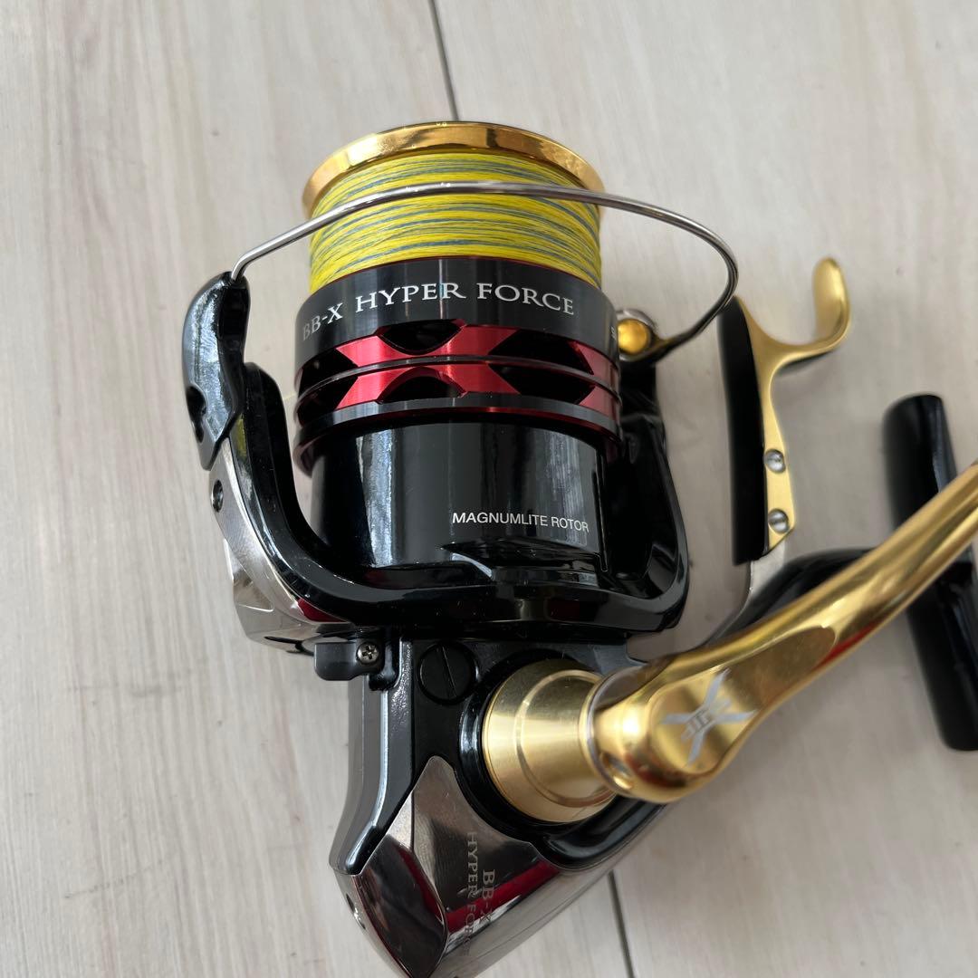 j2500DXG スピニングリール ブラック/ゴールドベイシス竿