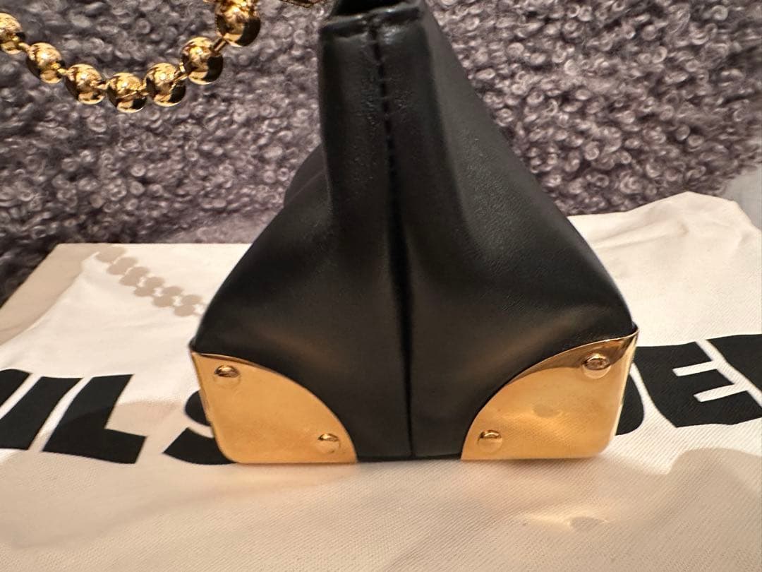 Sacai コーナーメタルクラッチ