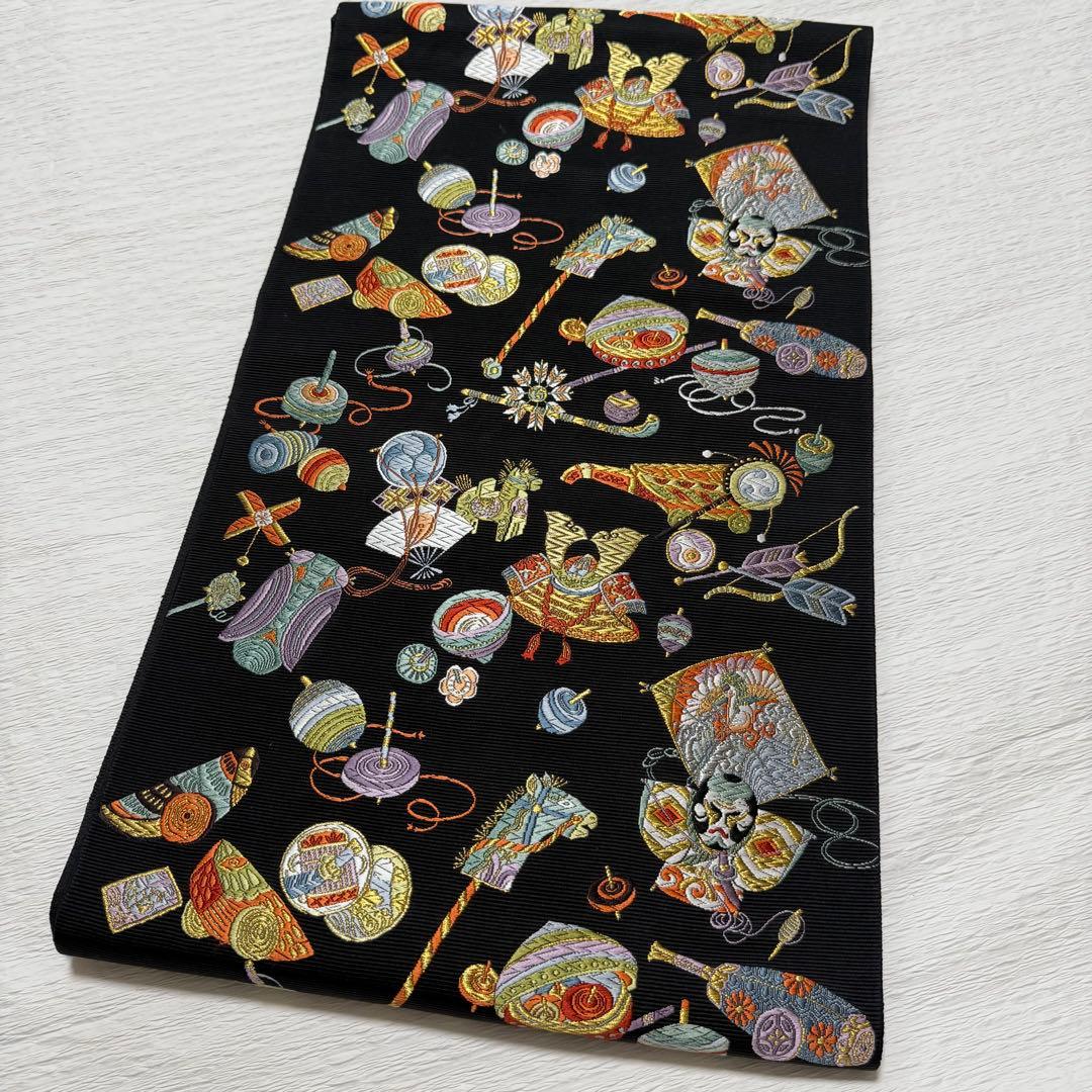 m-62 西陣 山下織物 遠野物語 袋帯 唐織 正絹 黒地 美品