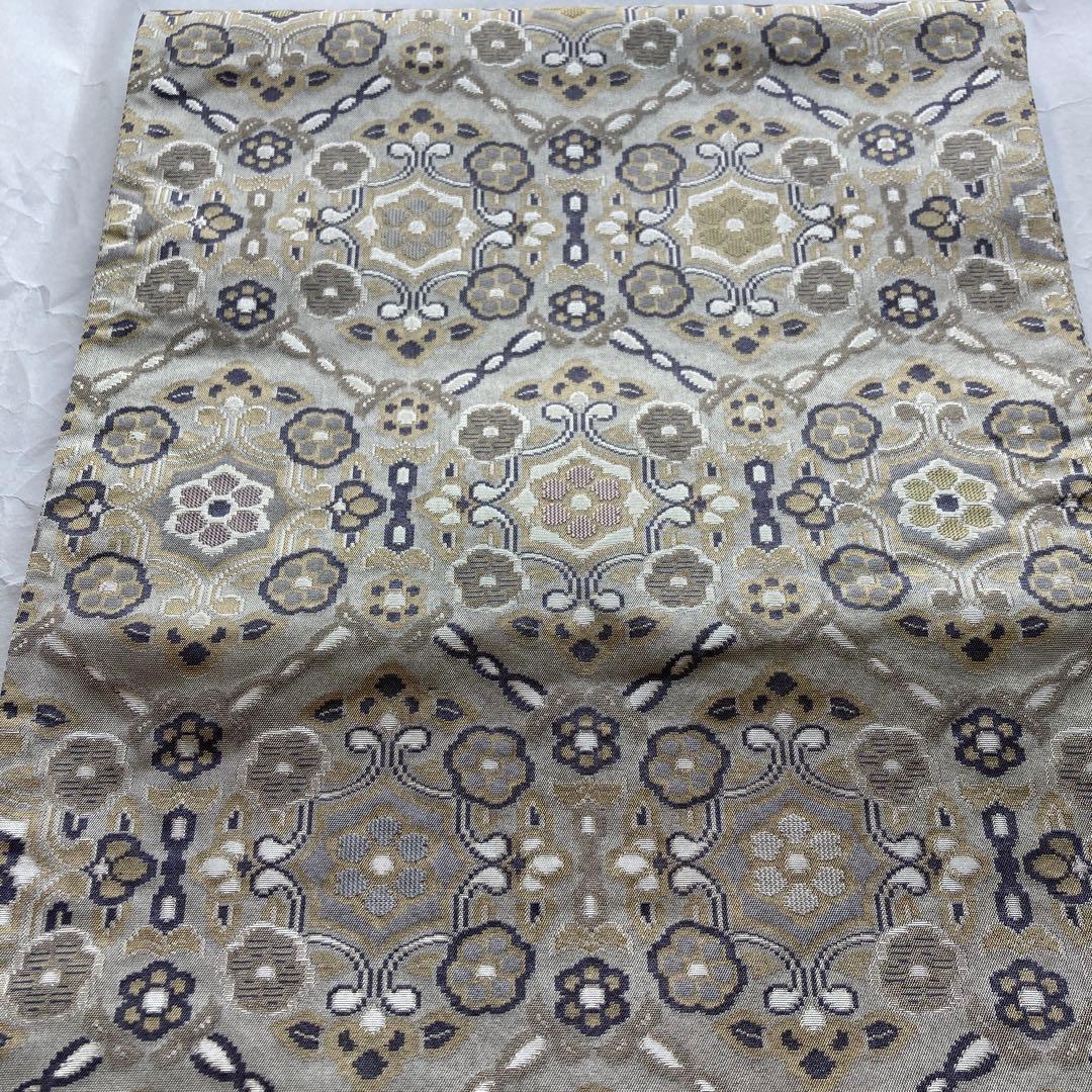 袋帯　全通　グレー系　花紋　亀甲紋様