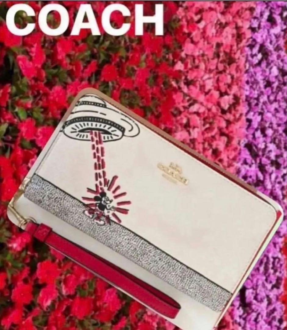 COACHストラップ付長財布ディズニーキースヘリング.コラボ.UFOプリント新品