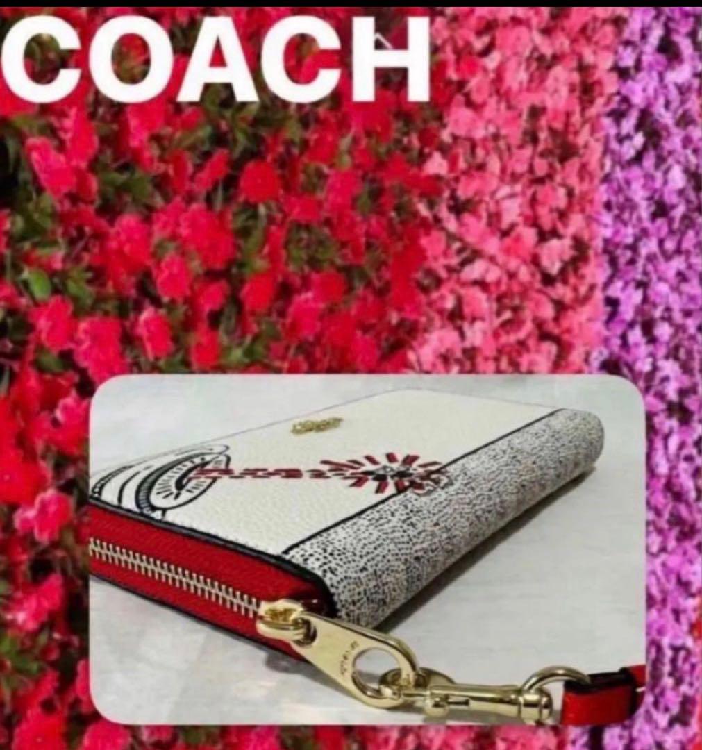 COACHストラップ付長財布ディズニーキースヘリング.コラボ.UFOプリント新品