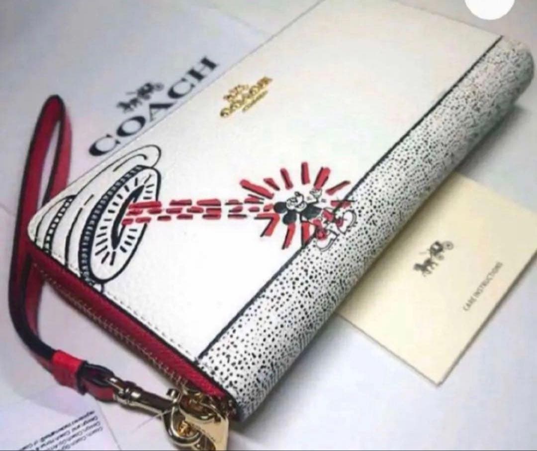 COACHストラップ付長財布ディズニーキースヘリング.コラボ.UFOプリント新品
