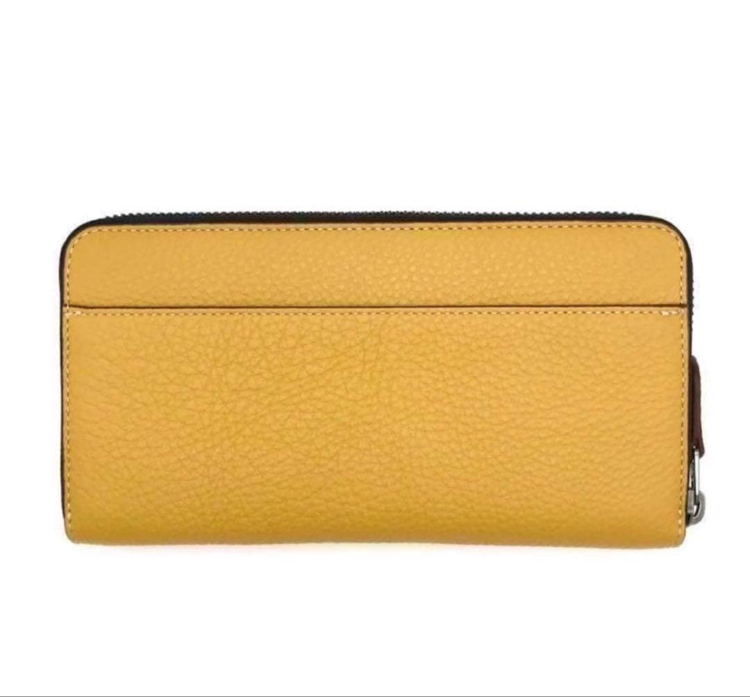 人気のコーチcoachスヌーピーコラボレザー長財布イエロー