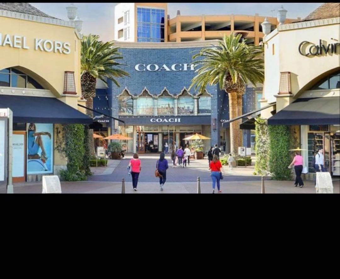 人気のコーチcoachスヌーピーコラボレザー長財布イエロー