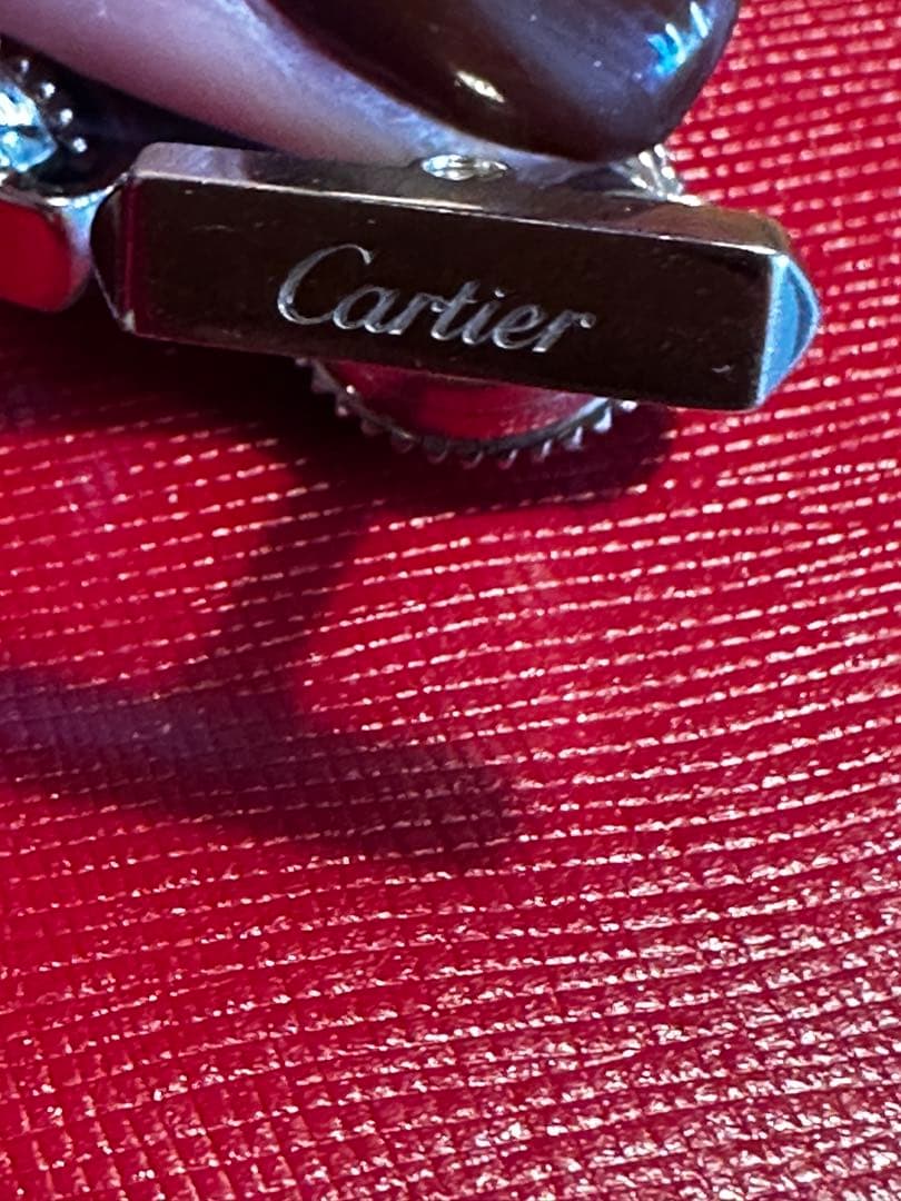 青色球体の金属製カフリンクス