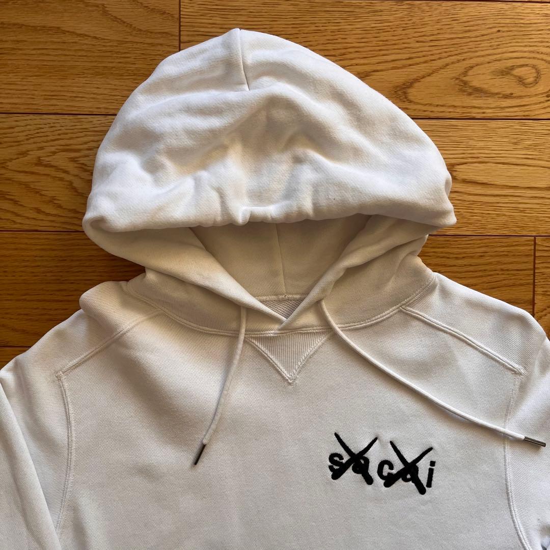 sacai × KAWS パーカー