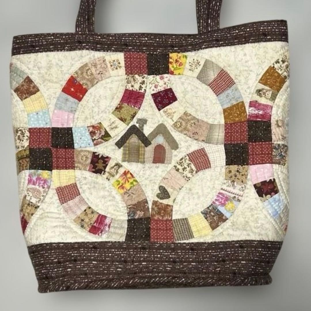 ダブルウェディングリングとハウスの大きめショルダー