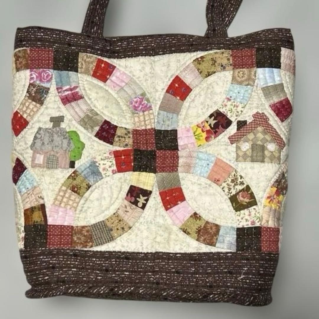 ダブルウェディングリングとハウスの大きめショルダー