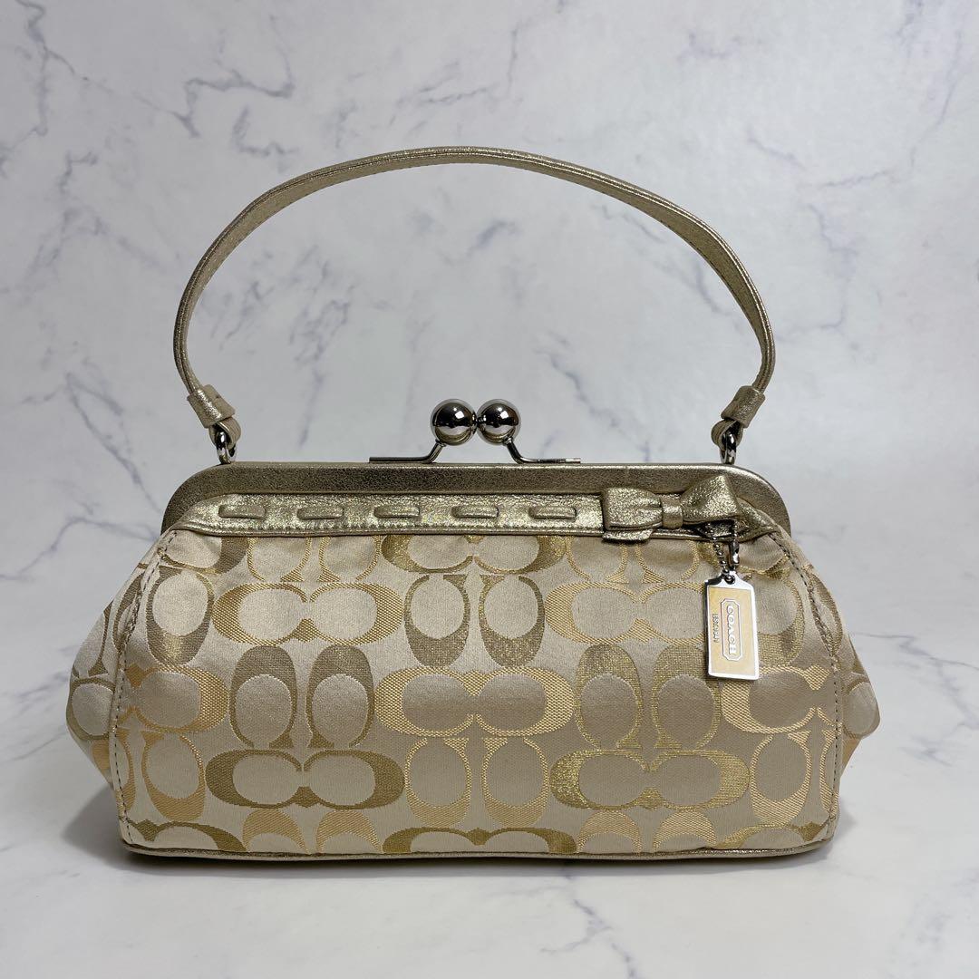 新品同様✨COACH アクセサリーポーチ がま口 シグネチャー イエローゴールド