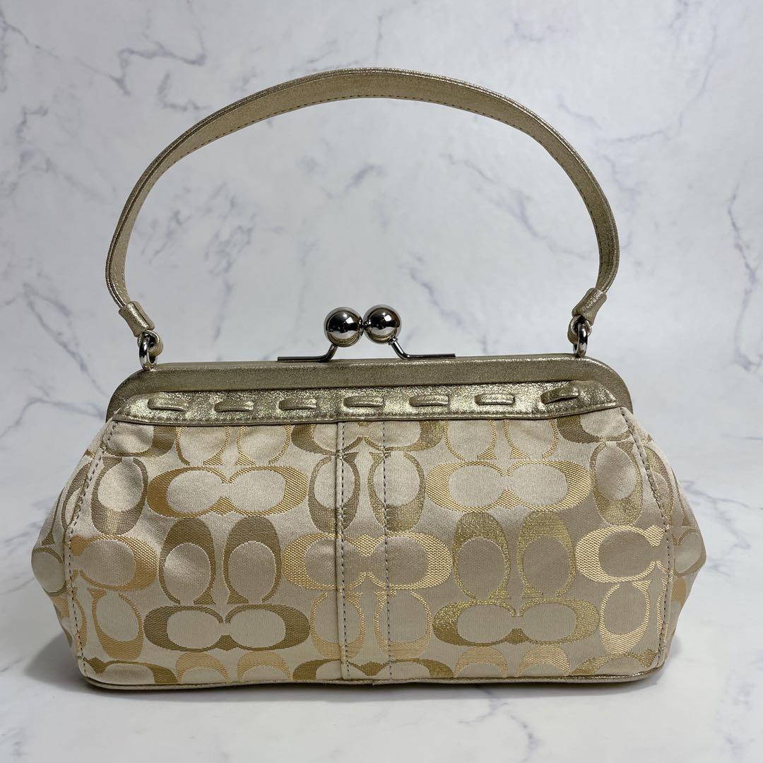 新品同様✨COACH アクセサリーポーチ がま口 シグネチャー イエローゴールド
