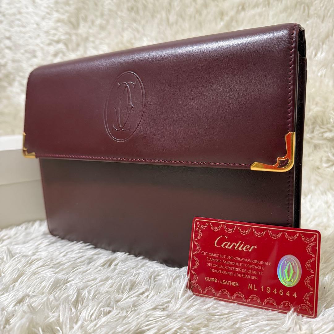 カルティエ　マストライン　クラッチバッグ　ボルドー　ロゴ金具