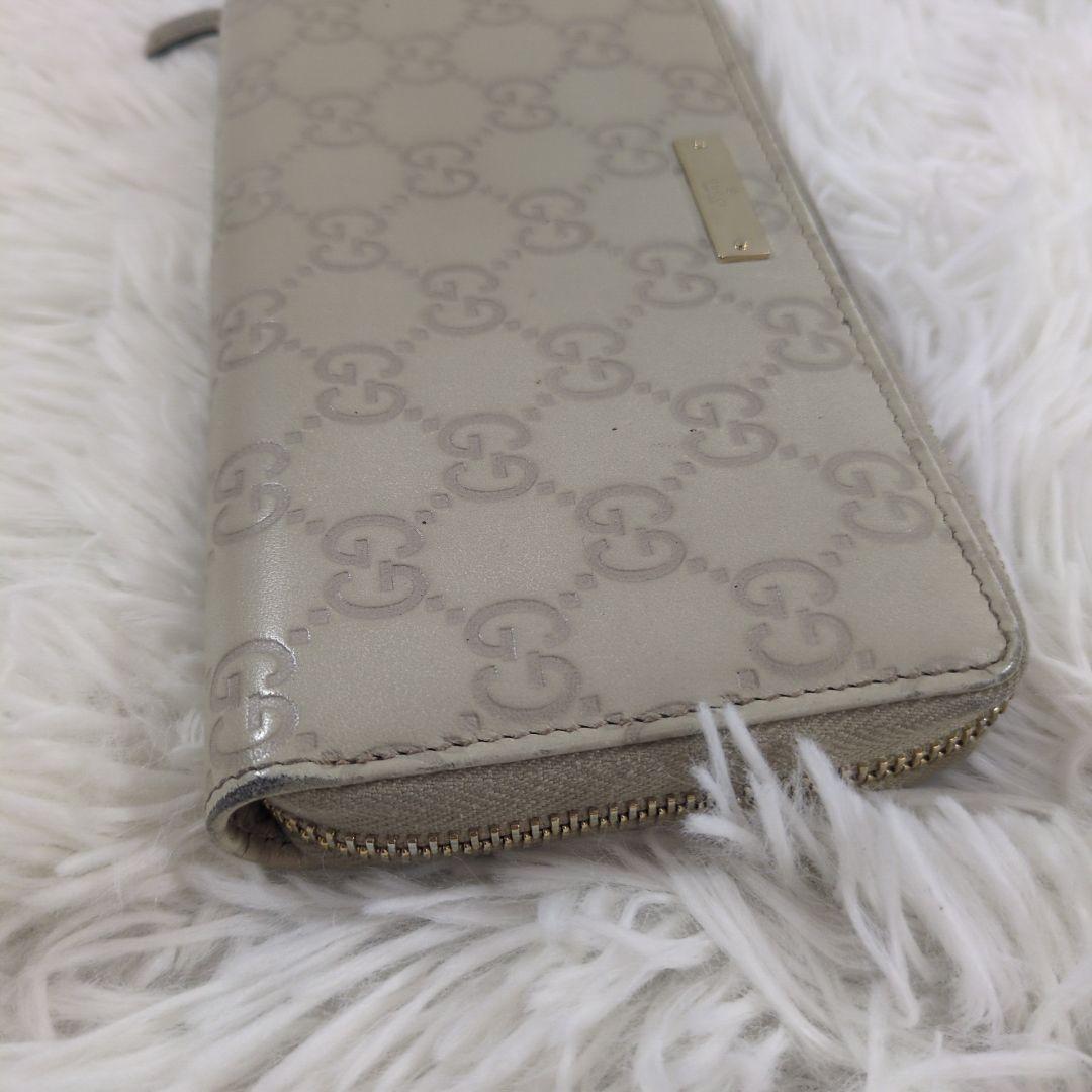 GUCCI 長財布 ラウンドジップ シマ 金プレート 型押し レザー ホワイト
