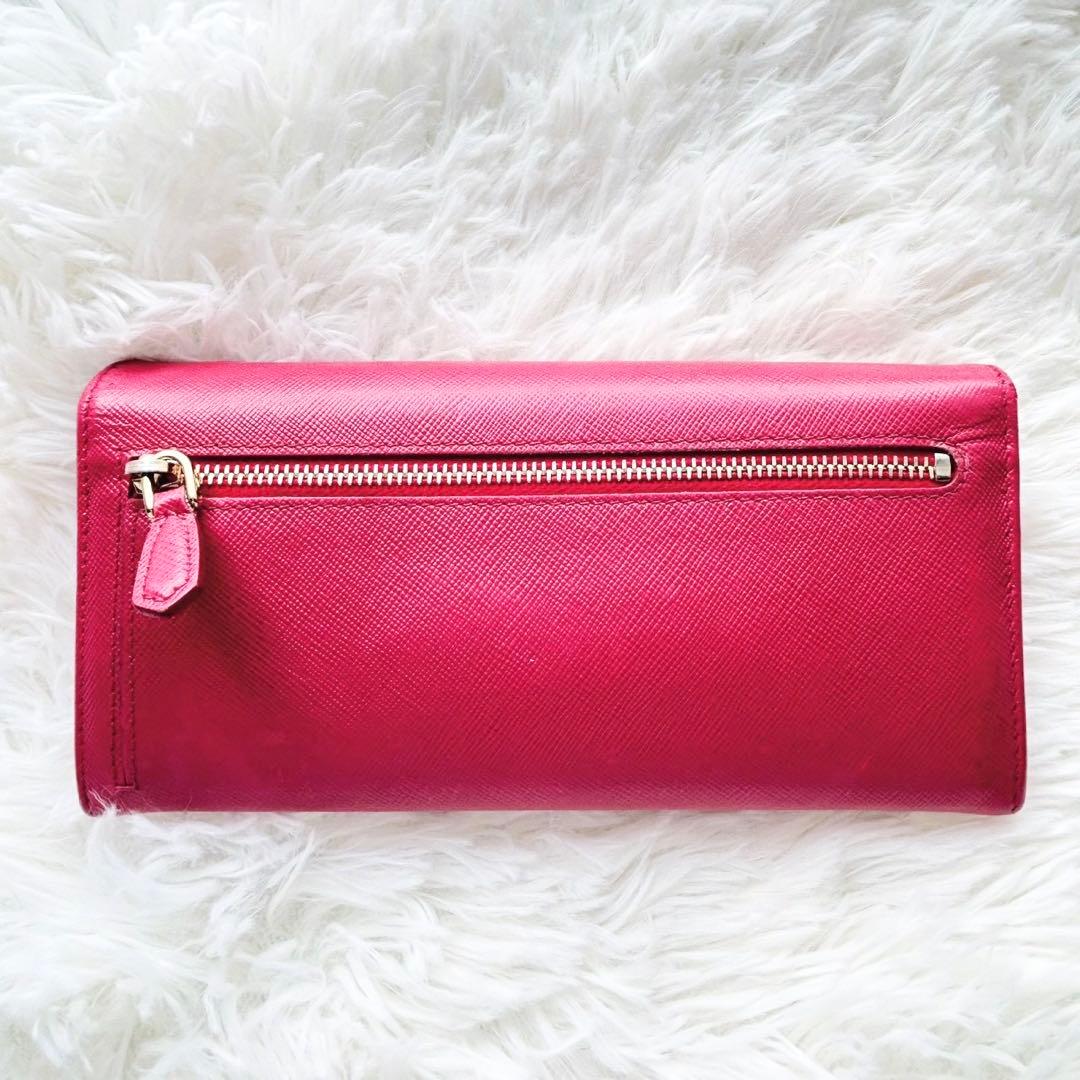 美品✨プラダ 長財布 サフィアーノ フィオッコ ピンク メタルロゴ リボン