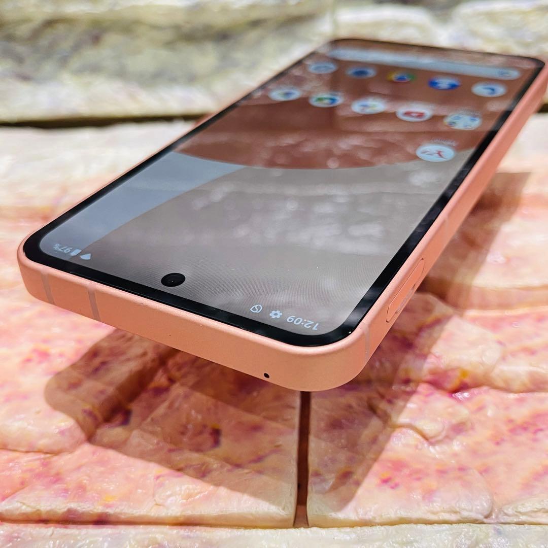 美品 SIMフリー AQUOS sense9 128GB コーラル 電池良好