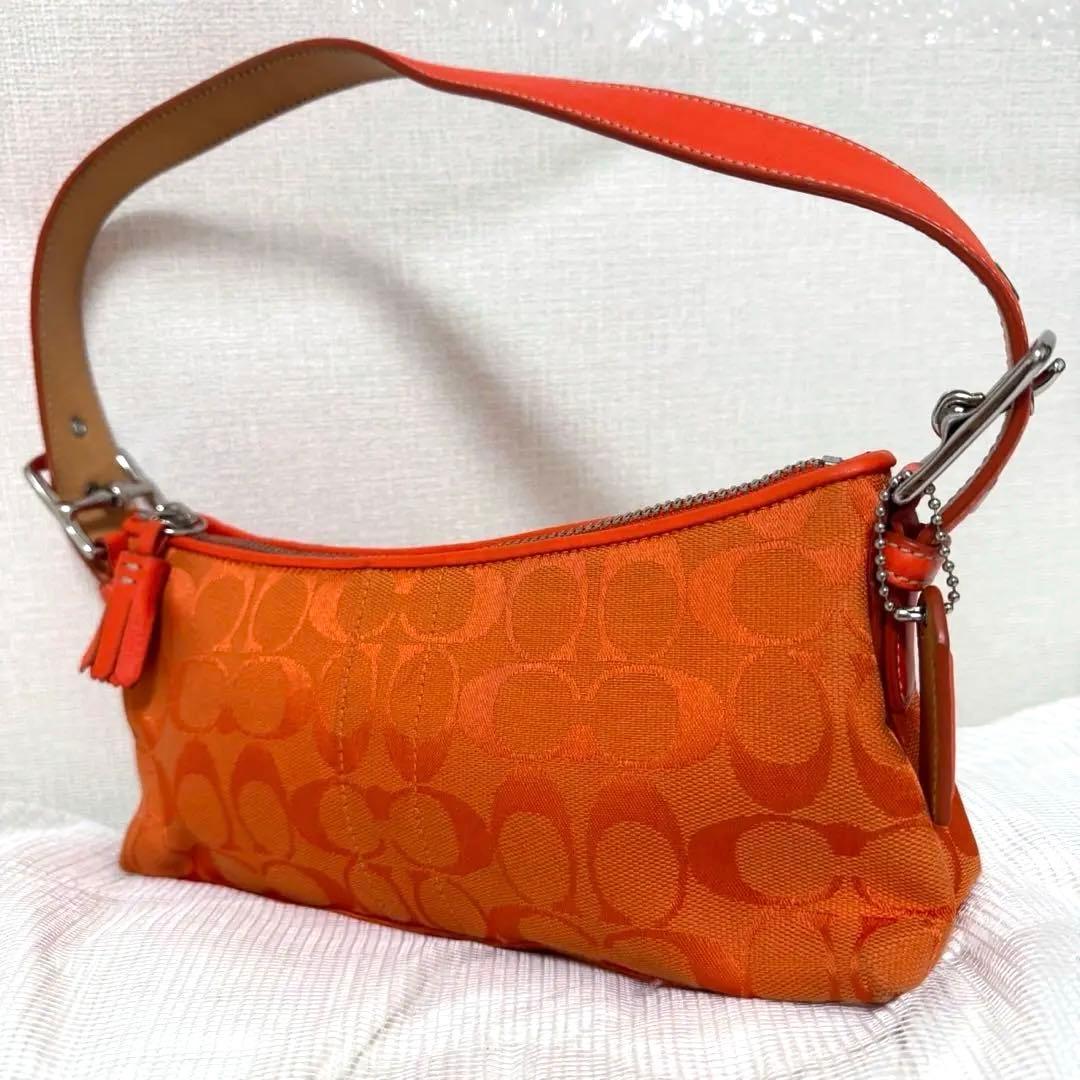 COACH アクセサリーポーチ　ワンショルダー　シグネチャー　オレンジ