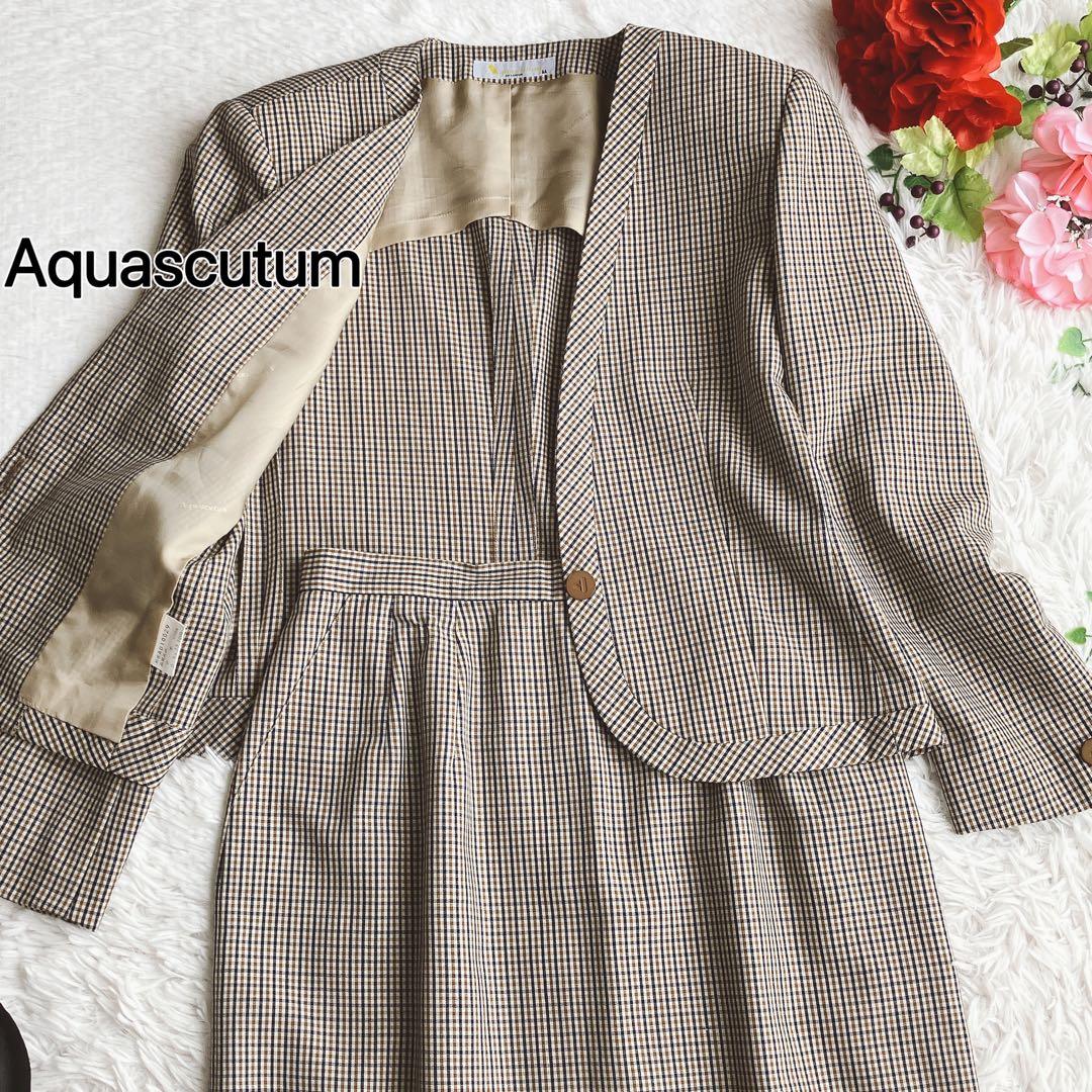 アクアスキュータム★クラブチェック総柄 ノーカラースカートスーツ ロングスカート