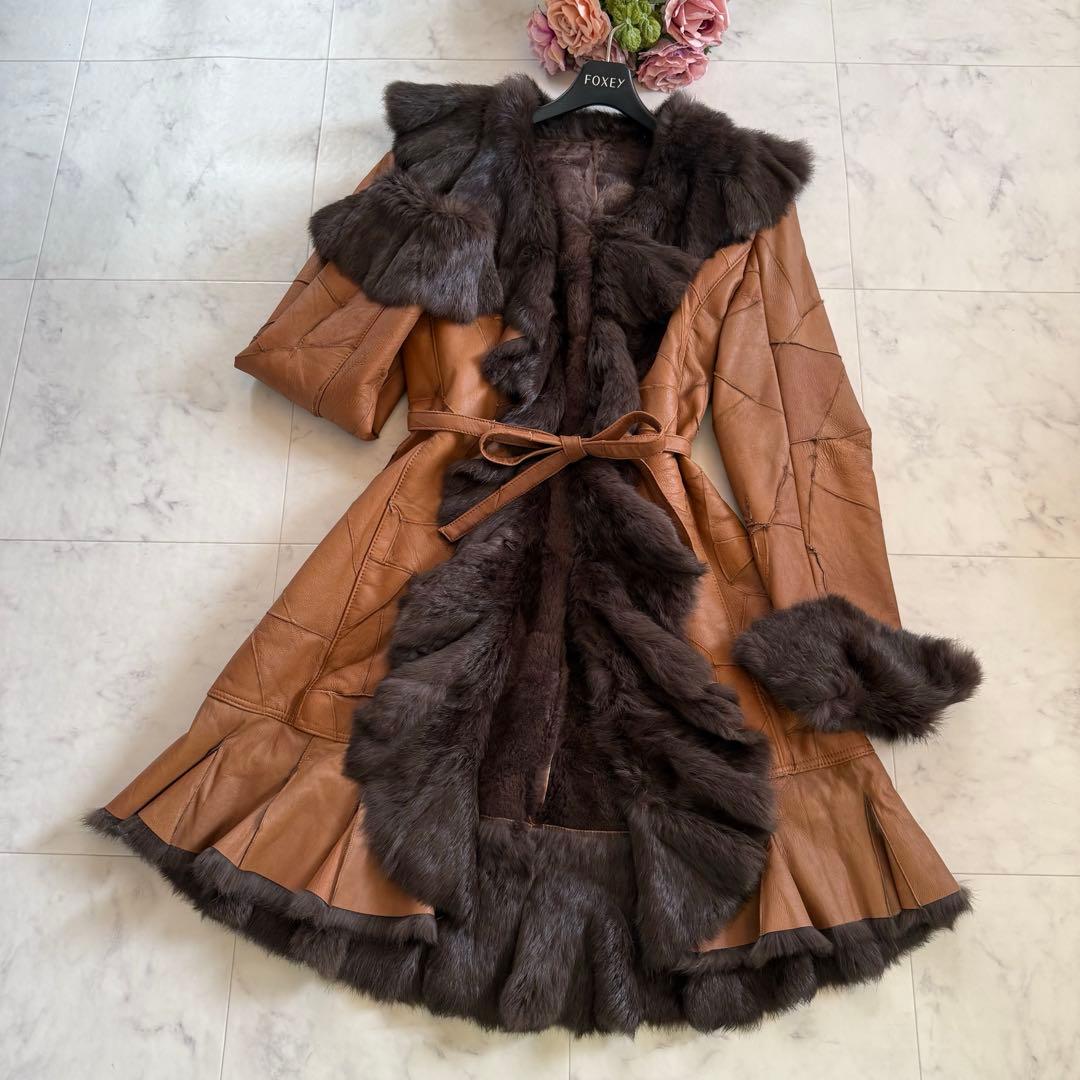 美品★ラビットファー 毛皮 羊革 女優襟 ロングベルテッドコート フリル L
