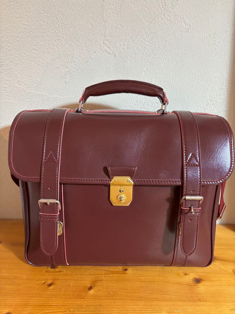 就実高校　通学バッグ　エンジ