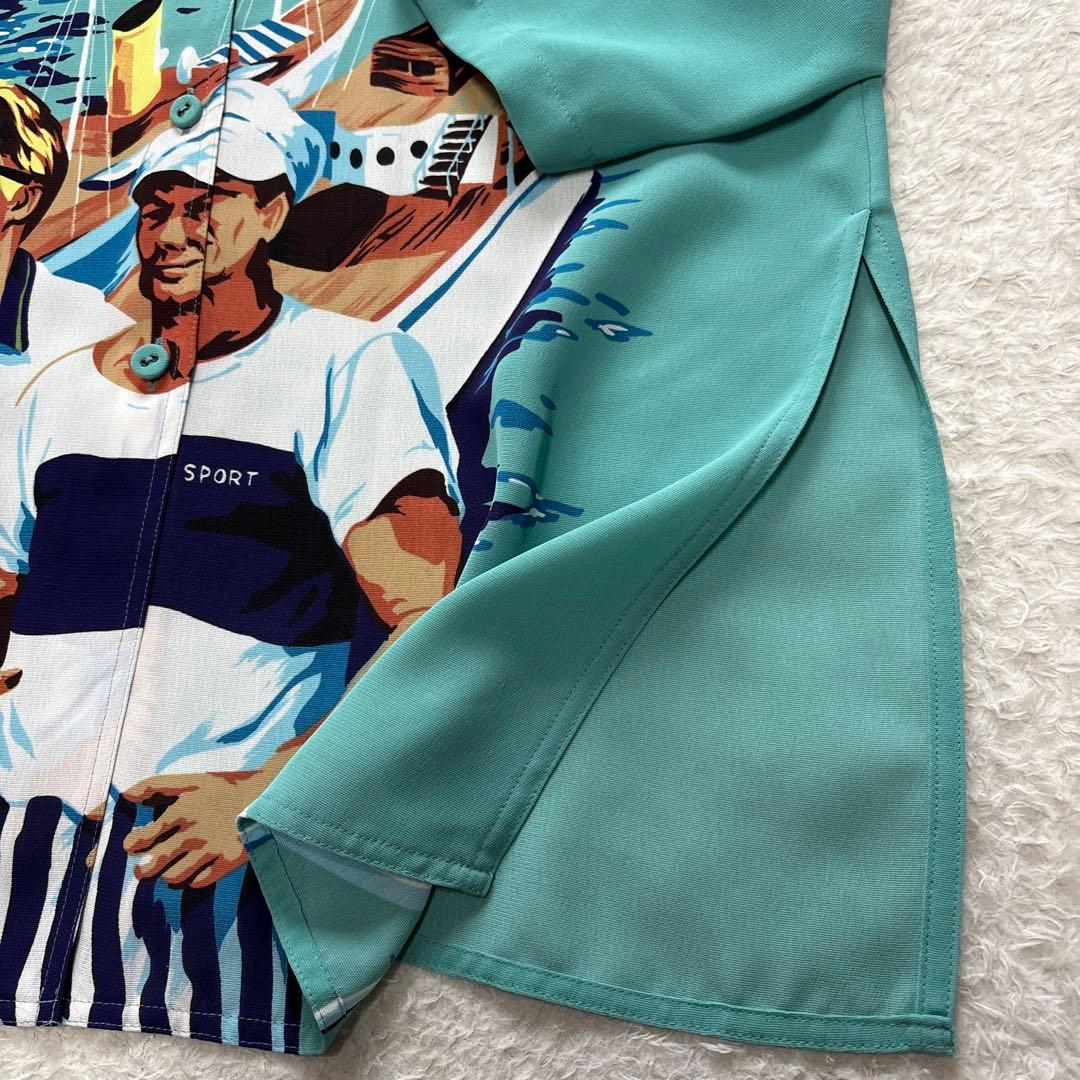 トクコプルミエヴォル　プリントチュニックシャツ　海岸　人々　リゾート　パリ