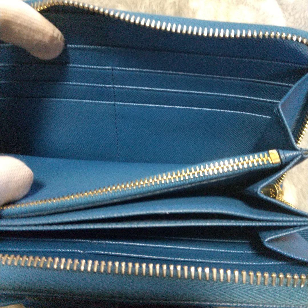 PRADAサフィアーノラウンドファスナー リボン付き長財布