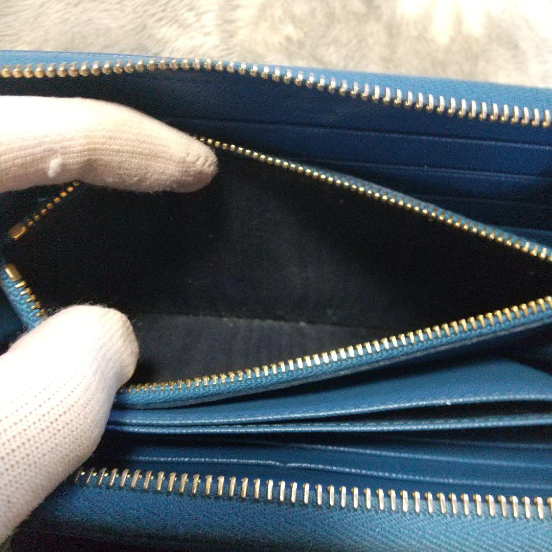 PRADAサフィアーノラウンドファスナー リボン付き長財布