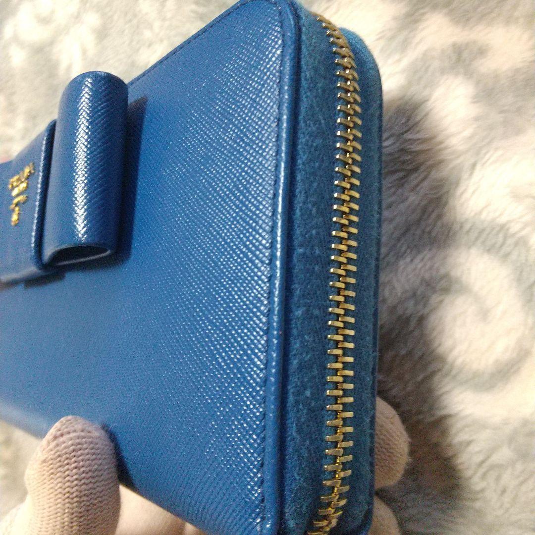 PRADAサフィアーノラウンドファスナー リボン付き長財布