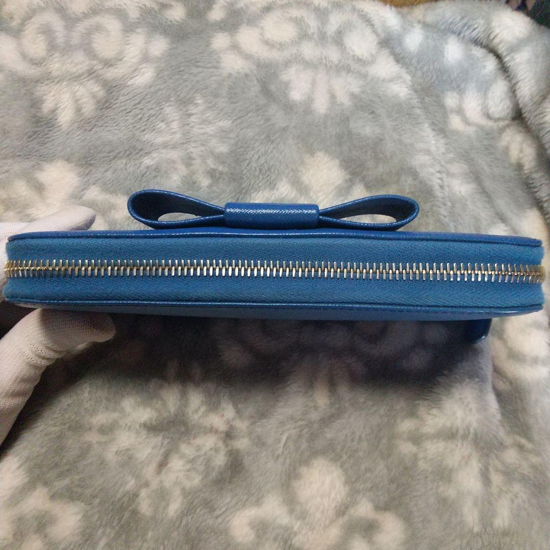 PRADAサフィアーノラウンドファスナー リボン付き長財布