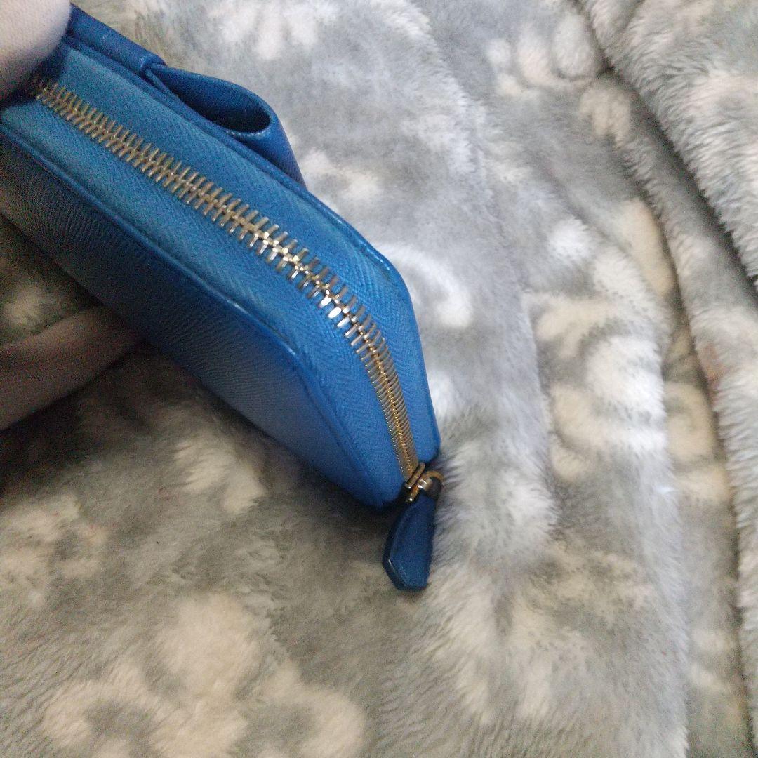 PRADAサフィアーノラウンドファスナー リボン付き長財布