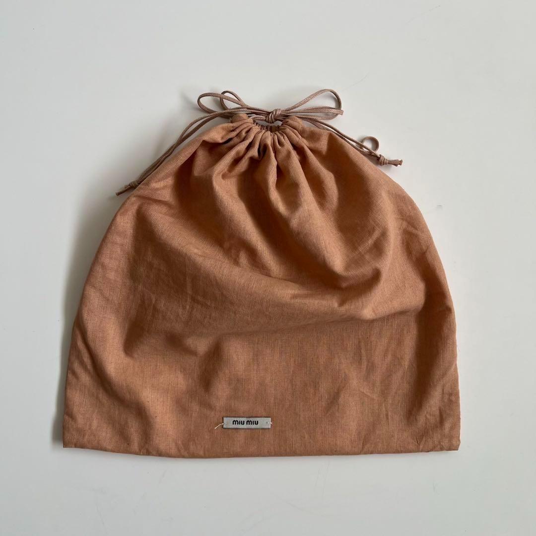 バッグ MIU MIU LEATHER STUDS FRAME CLUTCH BAG