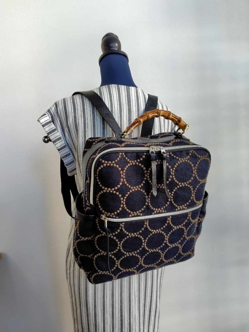 ミナペルホネン/タンバリンBK×カーキ/A4バンブーリュック本革黒