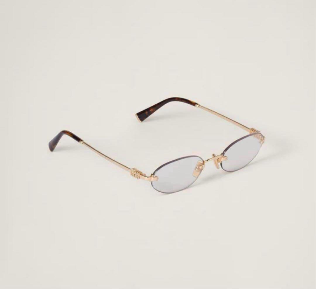 miumiu リムレスメガネ