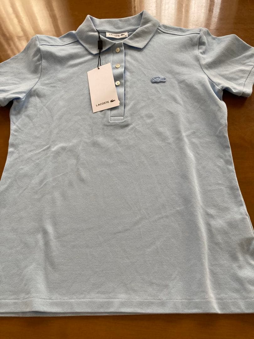 新品未使用品LACOSTE ライトブルーポロシャツ PF5462L size36