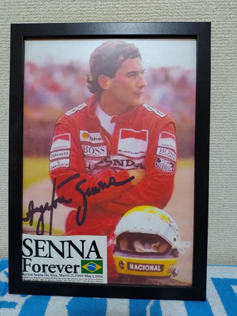 アイルトン・セナ サイン入り写真とF1カーとセナ愛用ヘルメットとCDの5点セット