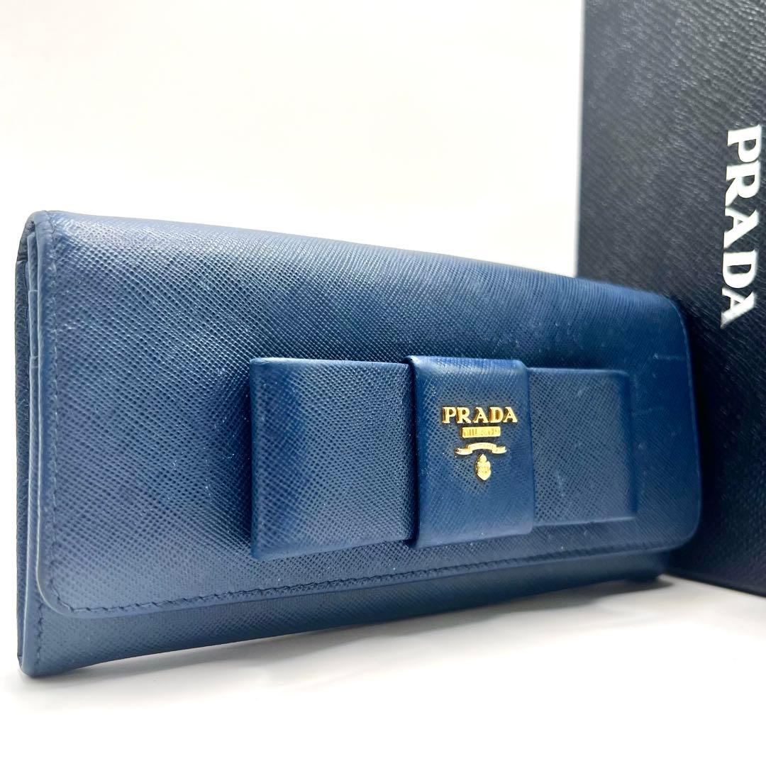 PRADA プラダ サフィアーノ 長財布 二つ折り 青 リボン 人気 フラップ