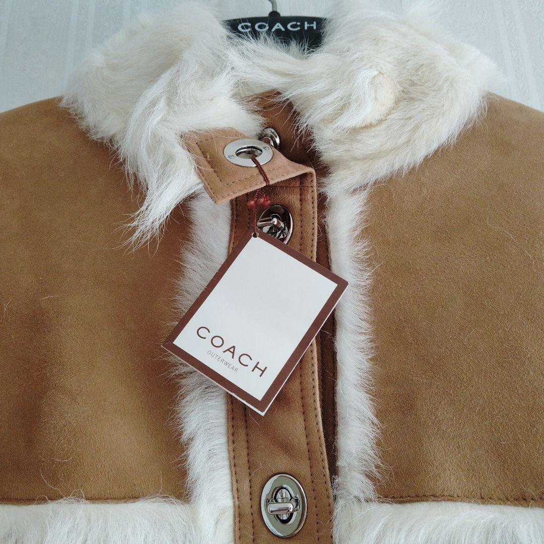 COACH ベージュ ファーケープ　ポンチョ　 新品タグ付き　M