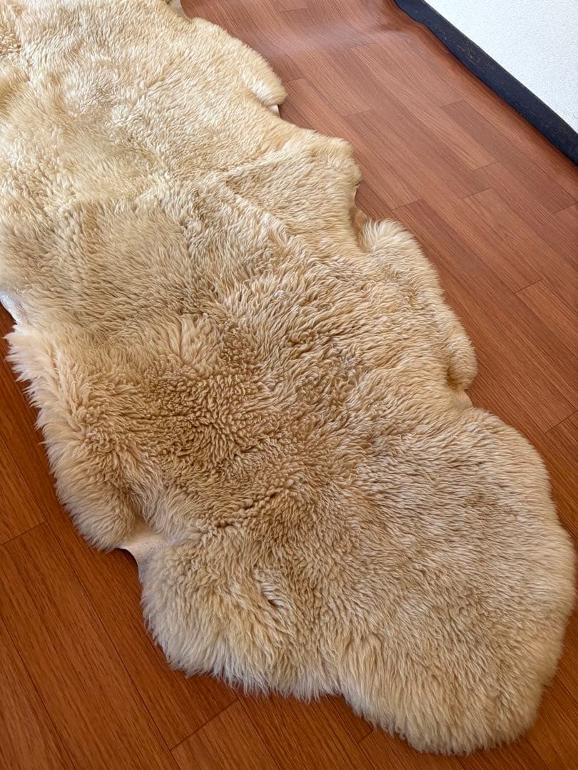 クリーム色 羊毛ラグ 約190cm x 80cm