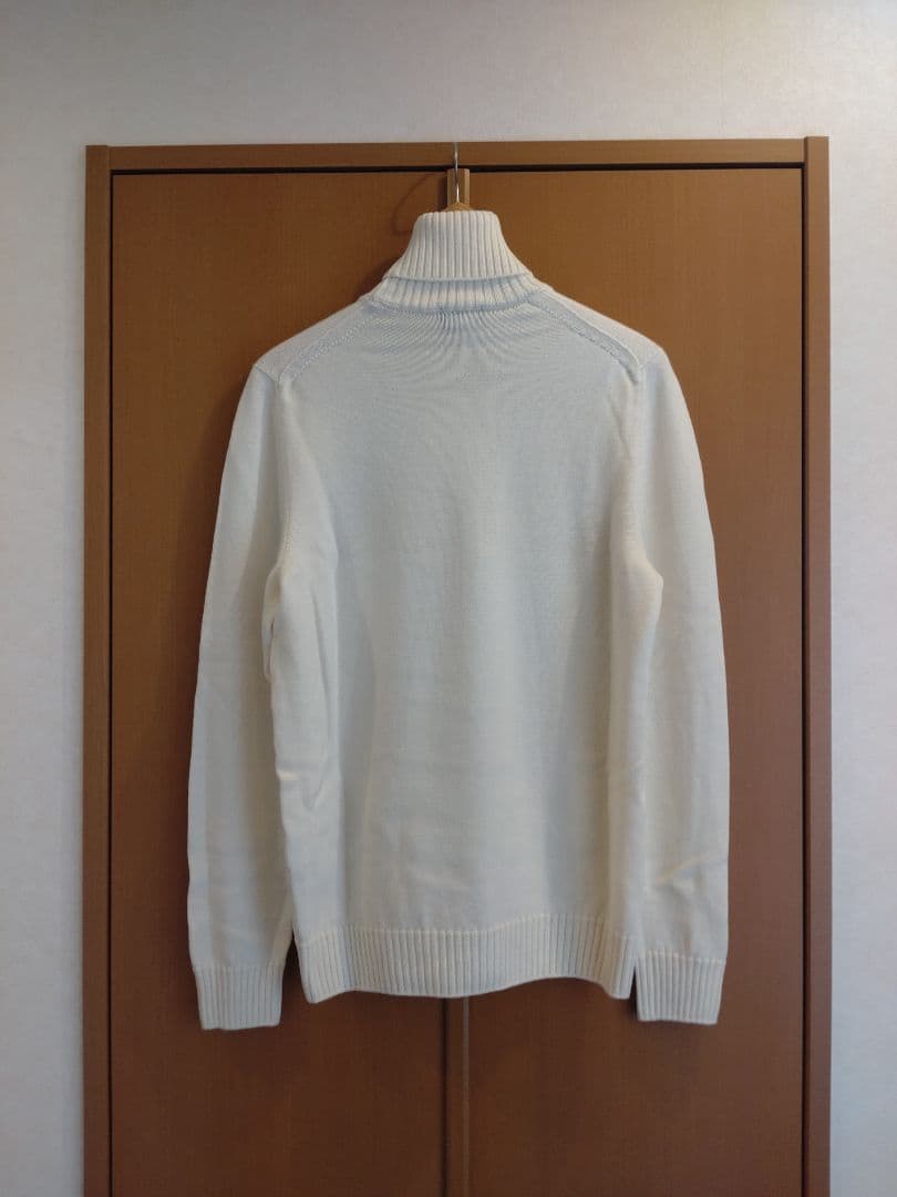 ドルモア タートルネック ニット
