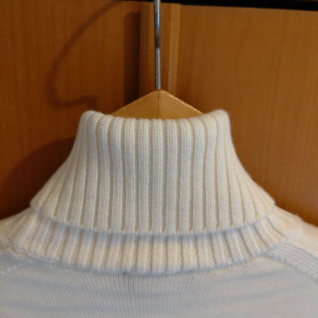 ドルモア タートルネック ニット