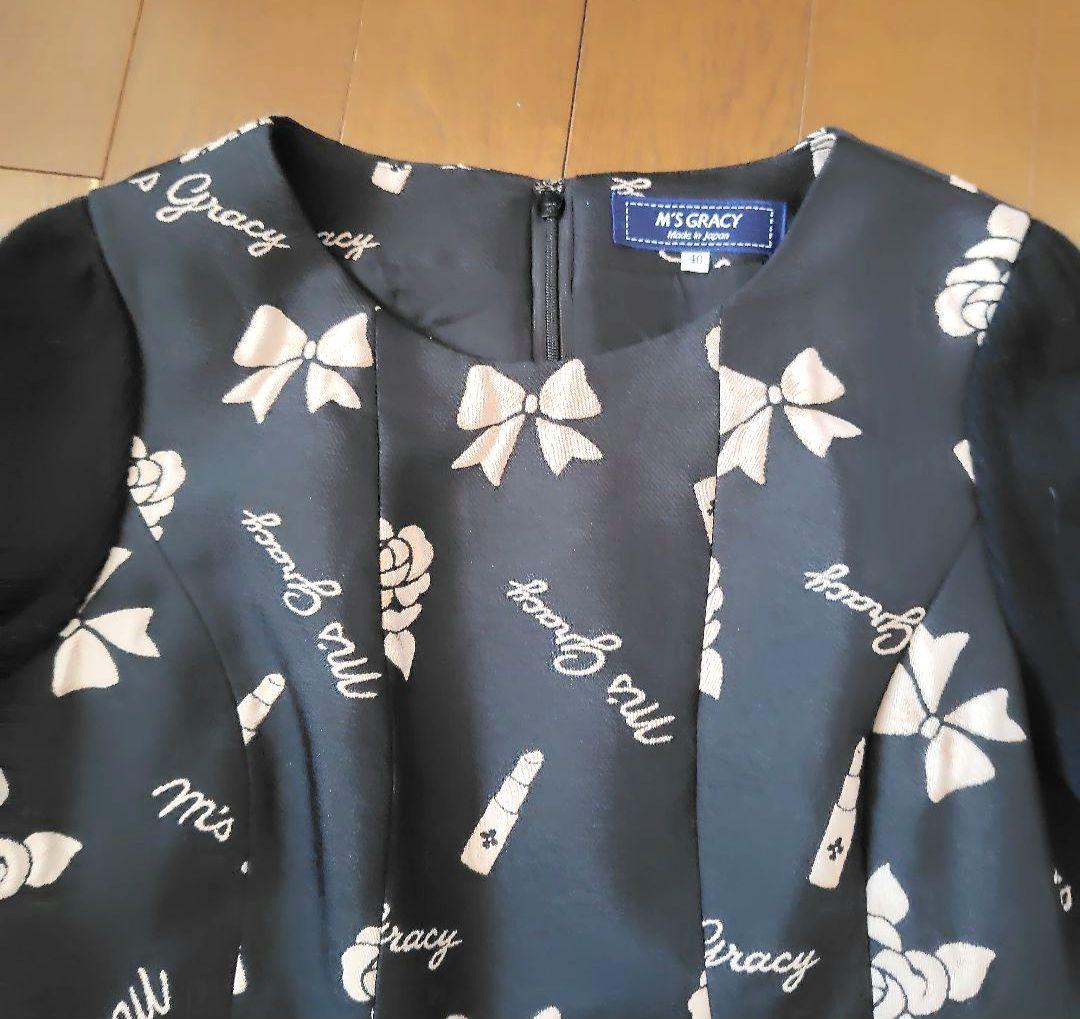 エムズグレイシー 花柄、リボン、リップ、ロゴ入り長袖ワンピース 40