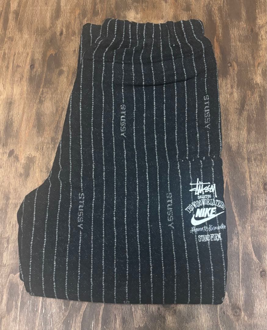 ステューシー × ナイキ ストライプ ウールパンツ ブラック