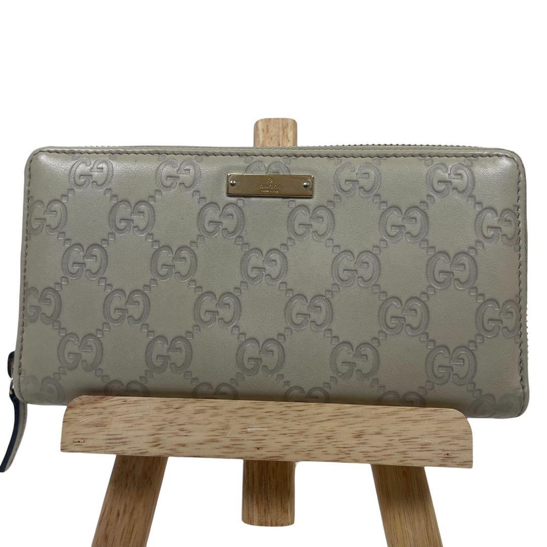 グッチ　長財布　GGシマレザー　ロゴプレート　ロゴ総柄　型押　ラウンドファスナー