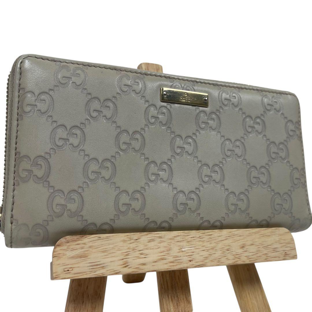 グッチ　長財布　GGシマレザー　ロゴプレート　ロゴ総柄　型押　ラウンドファスナー