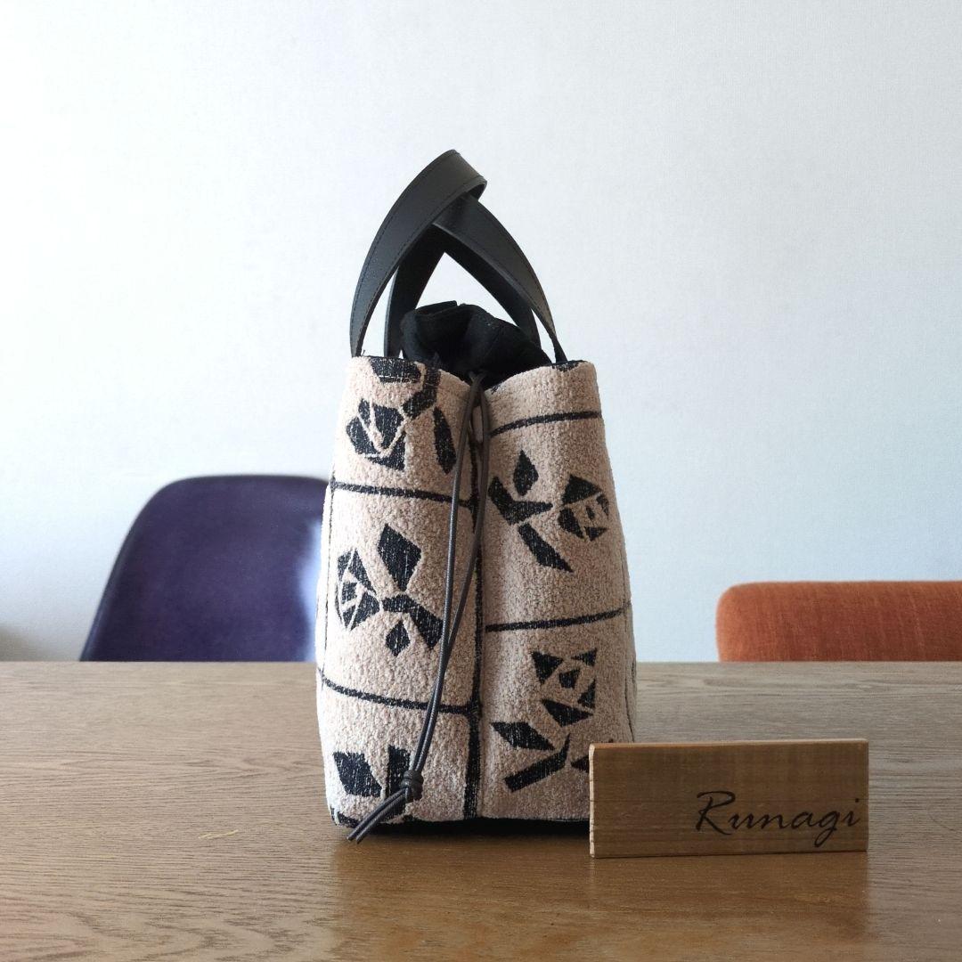 あおりポケットの巾着バッグ＊ミナペルホネン lulu