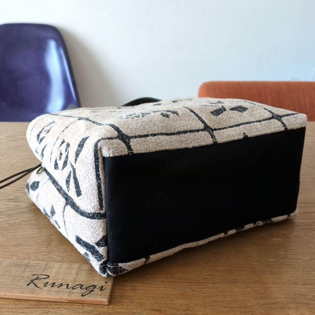 あおりポケットの巾着バッグ＊ミナペルホネン lulu