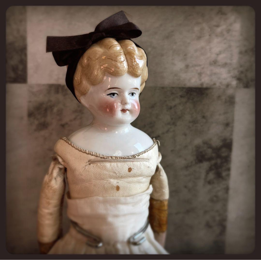 アンティーク ブロンド　チャイナヘッドドール　レザーボディ