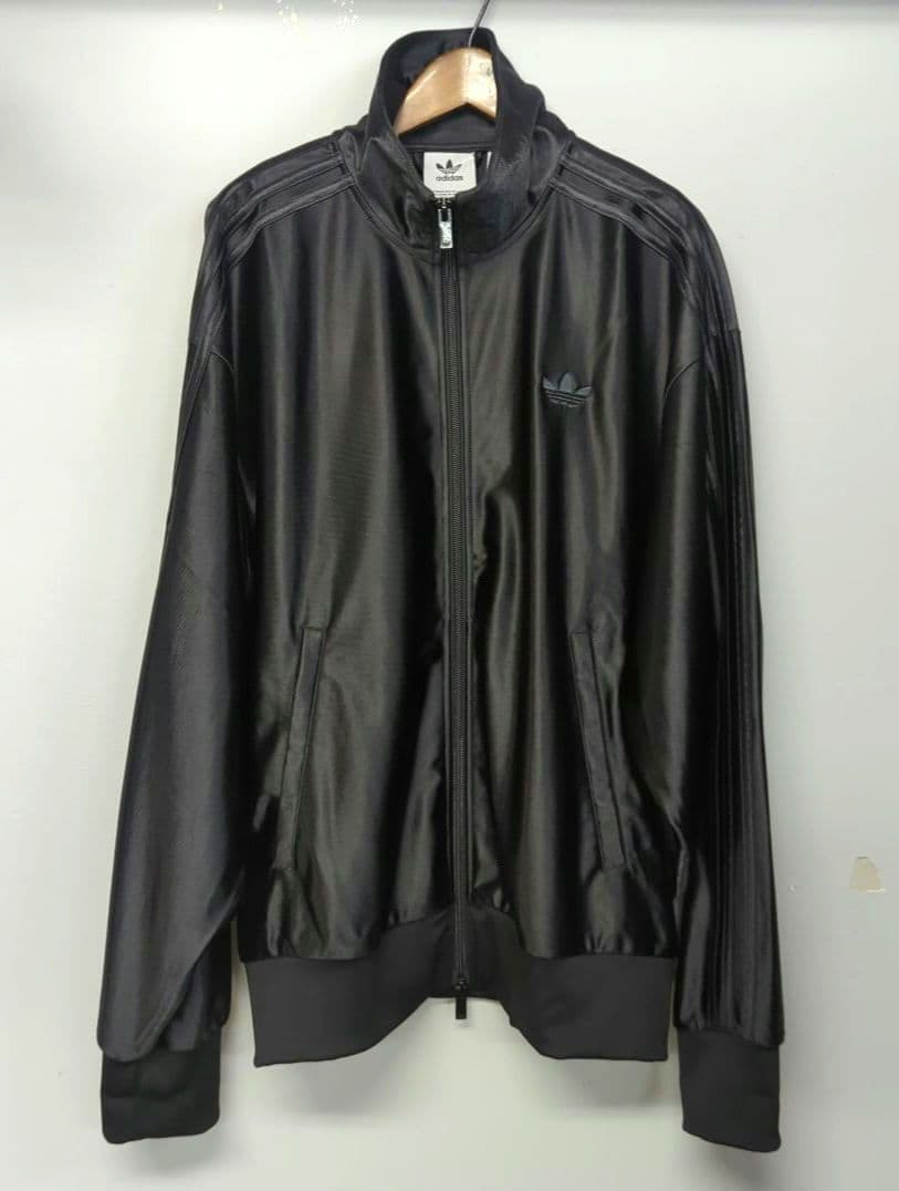 トップス adidas OVERSIZED FIRE BIRD TRACK TOP