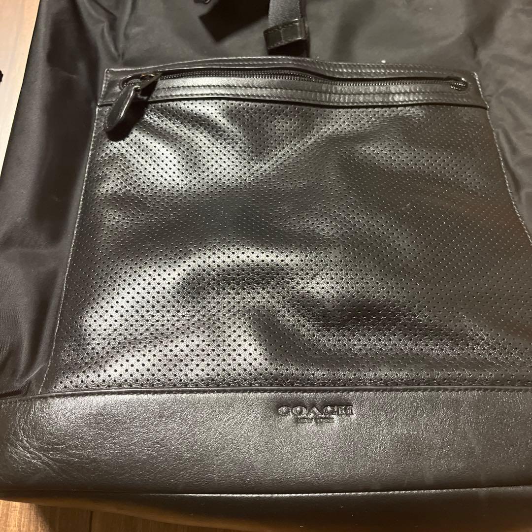 【としゆき】COACH ブラック ロールトップリュック