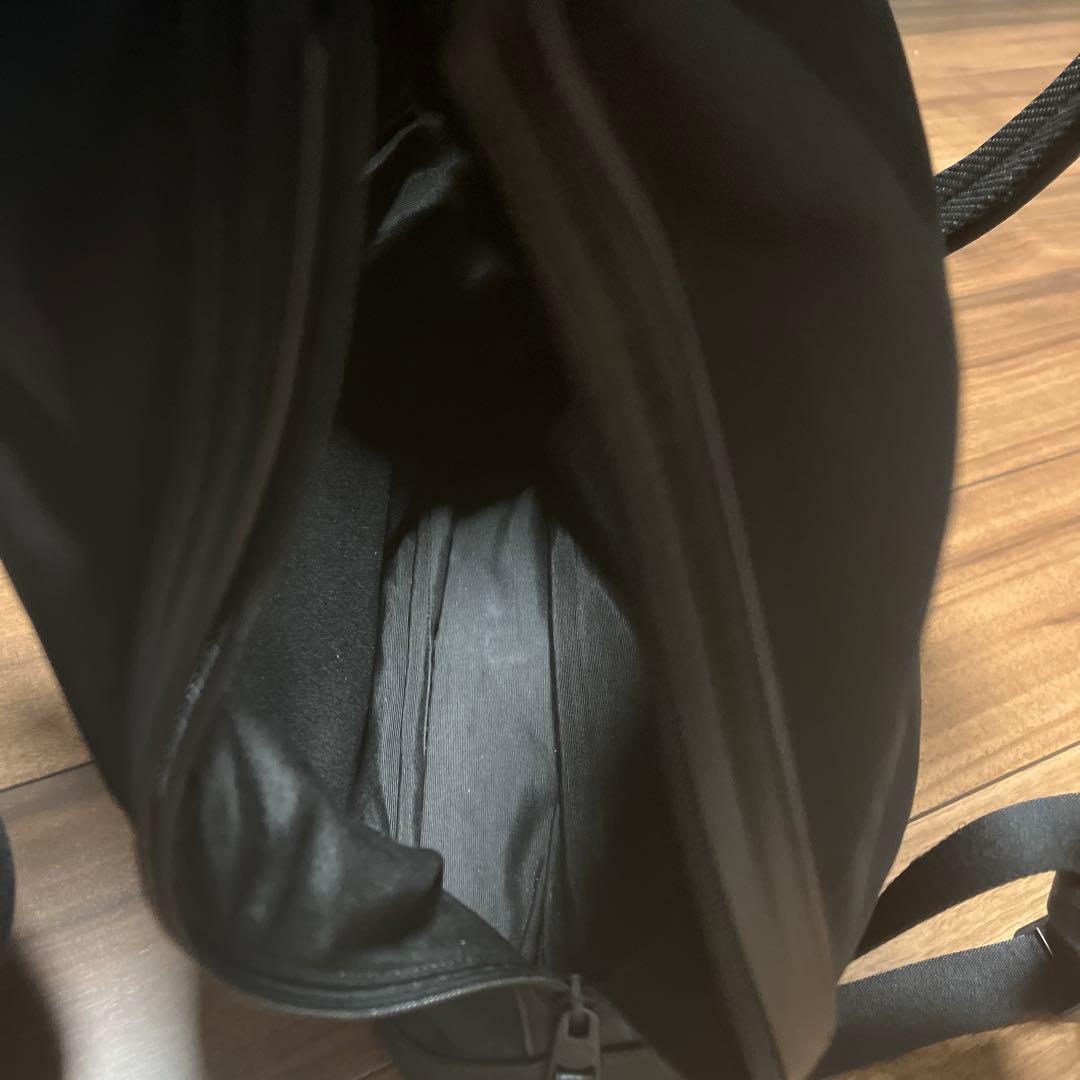 【としゆき】COACH ブラック ロールトップリュック